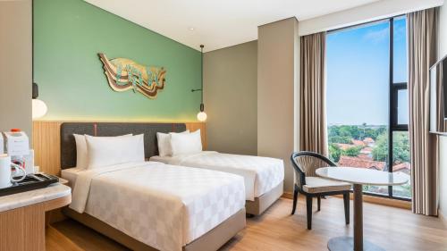 Imagen de la habitación del Hotel Swiss-Belinn Indramayu. Foto 18