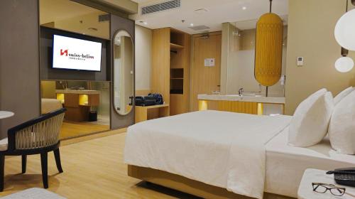 Imagen de la habitación del Hotel Swiss-Belinn Indramayu. Foto 20