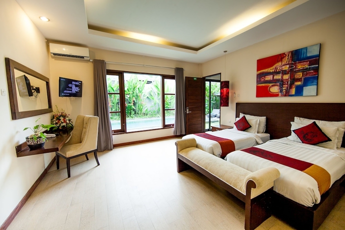 Imagen de la habitación del Hotel Swiss-Belvillas Umalas. Foto 3