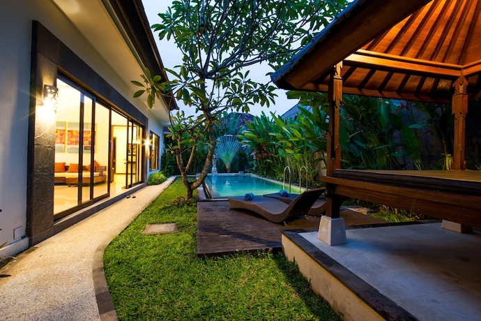 Imagen de la habitación del Hotel Swiss-Belvillas Umalas. Foto 4