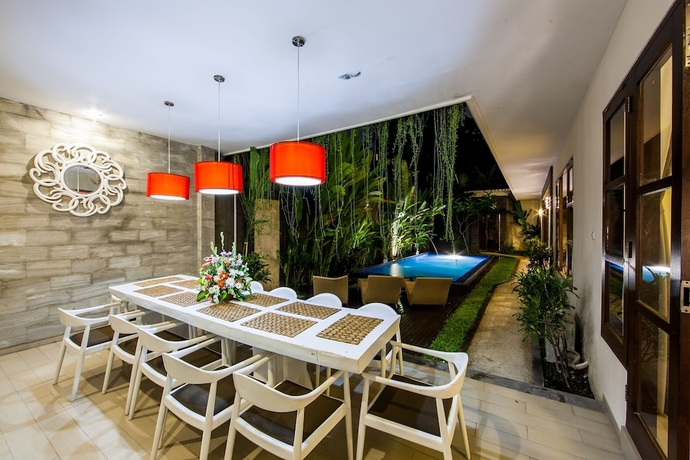 Imagen de la habitación del Hotel Swiss-Belvillas Umalas. Foto 18