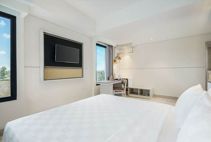 Imagen de la habitación del Hotel Swiss-belcourt Lombok. Foto 14