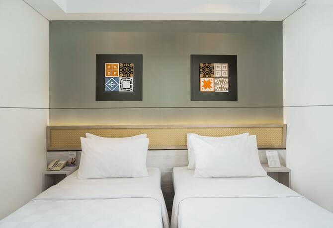 Imagen de la habitación del Hotel Swiss-belcourt Lombok. Foto 16