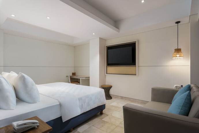 Imagen de la habitación del Hotel Swiss-belcourt Lombok. Foto 17