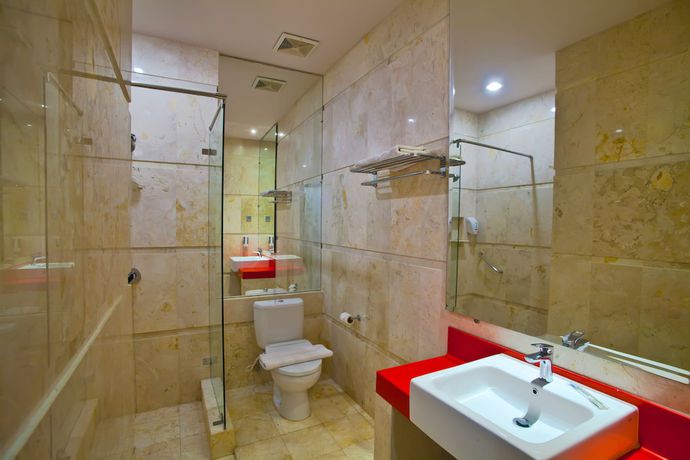 Imagen de la habitación del Hotel Swiss-belcourt Makassar. Foto 5