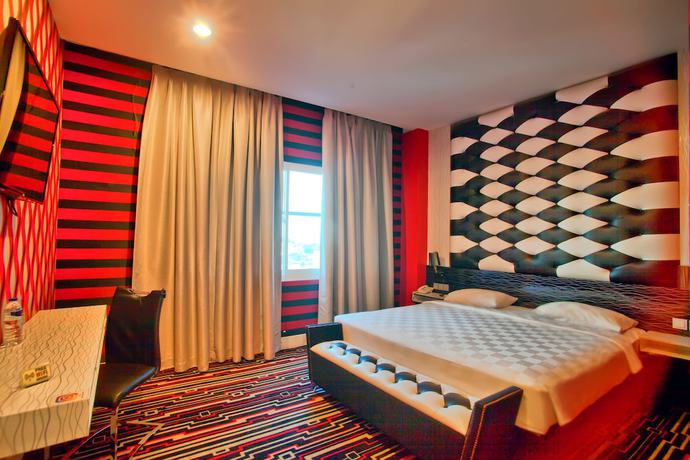 Imagen de la habitación del Hotel Swiss-belcourt Makassar. Foto 6