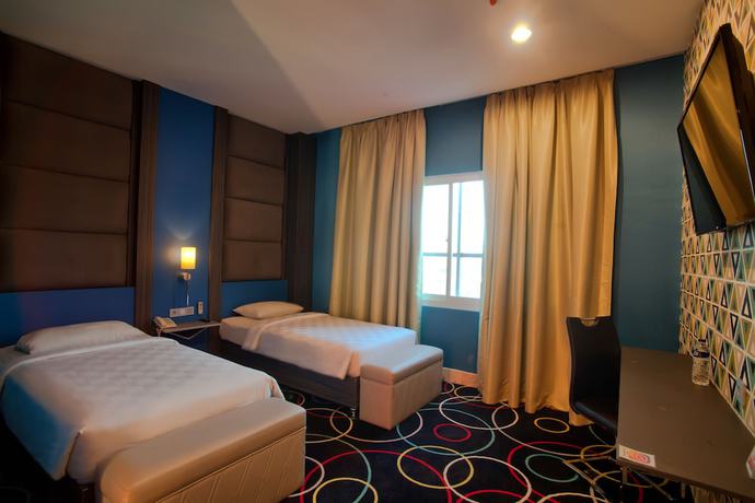 Imagen de la habitación del Hotel Swiss-belcourt Makassar. Foto 7