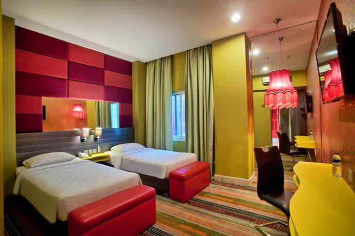 Imagen de la habitación del Hotel Swiss-belcourt Makassar. Foto 8