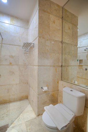 Imagen de la habitación del Hotel Swiss-belcourt Makassar. Foto 10