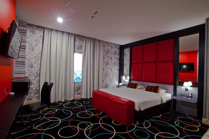 Imagen de la habitación del Hotel Swiss-belcourt Makassar. Foto 11