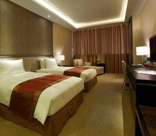 Imagen de la habitación del Hotel Swiss-belhotel Liyuan Wuxi. Foto 9