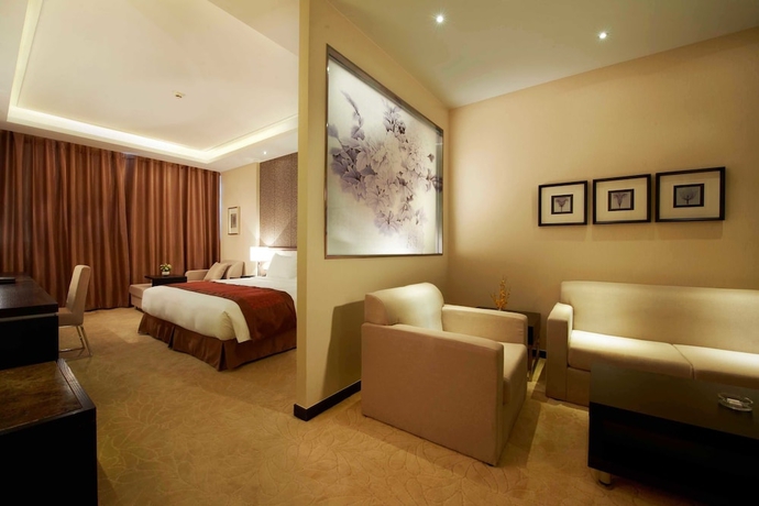 Imagen de la habitación del Hotel Swiss-belhotel Liyuan Wuxi. Foto 11