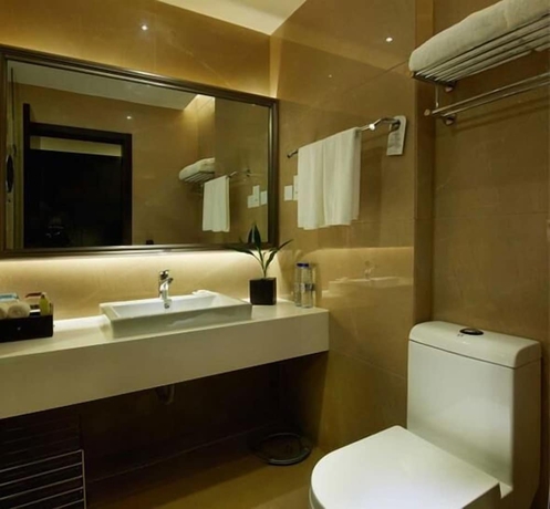 Imagen de la habitación del Hotel Swiss-belhotel Liyuan Wuxi. Foto 13