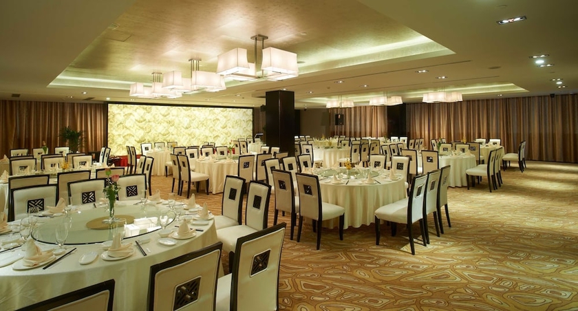 Imagen del bar/restaurante del Hotel Swiss-belhotel Liyuan Wuxi. Foto 3