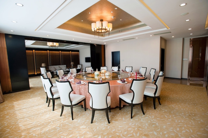 Imagen del bar/restaurante del Hotel Swiss-belhotel Liyuan Wuxi. Foto 4
