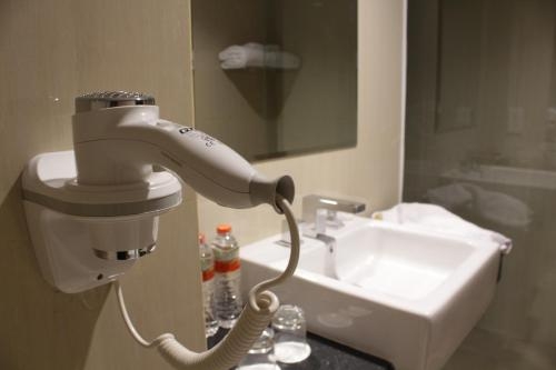 Imagen de la habitación del Hotel Swiss-belhotel Makassar. Foto 6