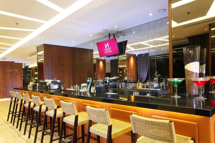 Imagen del bar/restaurante del Hotel Swiss-belhotel Pondok Indah. Foto 3