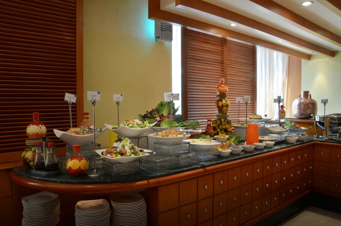 Imagen del bar/restaurante del Hotel Swiss-belhotel Sharjah. Foto 3