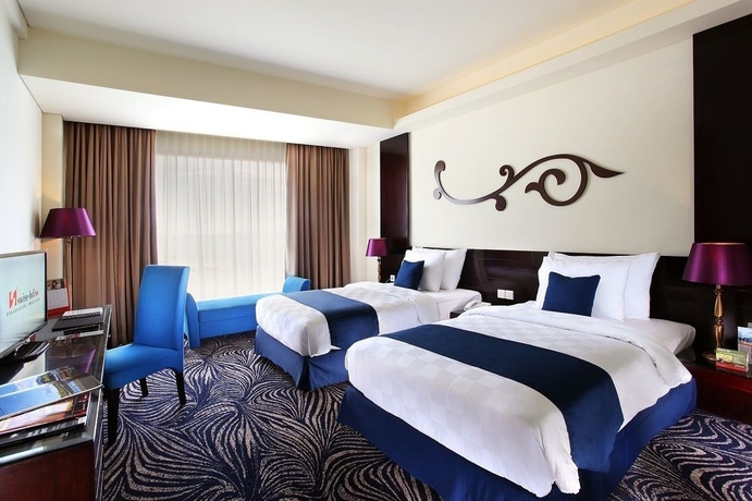 Imagen de la habitación del Hotel Swiss-belhotel Silae Palu. Foto 6