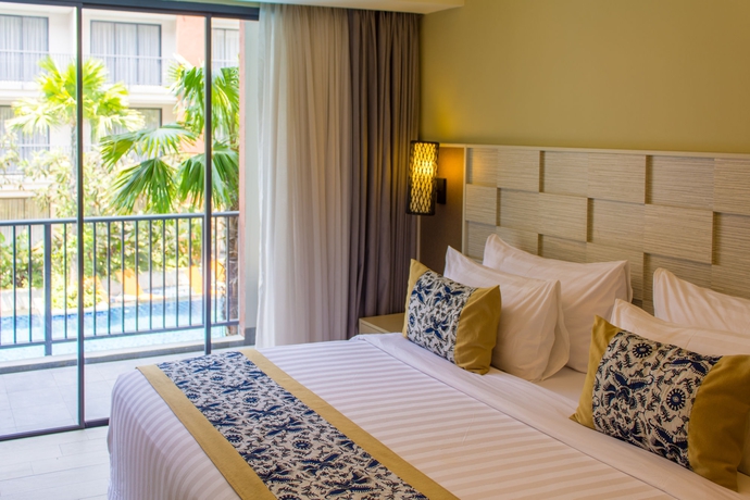 Imagen de la habitación del Hotel Swiss-belhotel Tuban. Foto 7