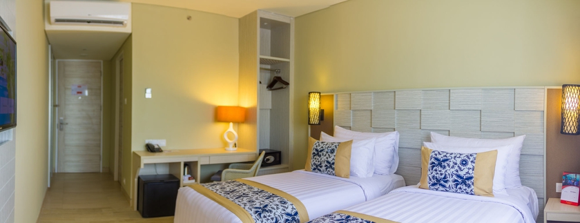 Imagen de la habitación del Hotel Swiss-belhotel Tuban. Foto 8