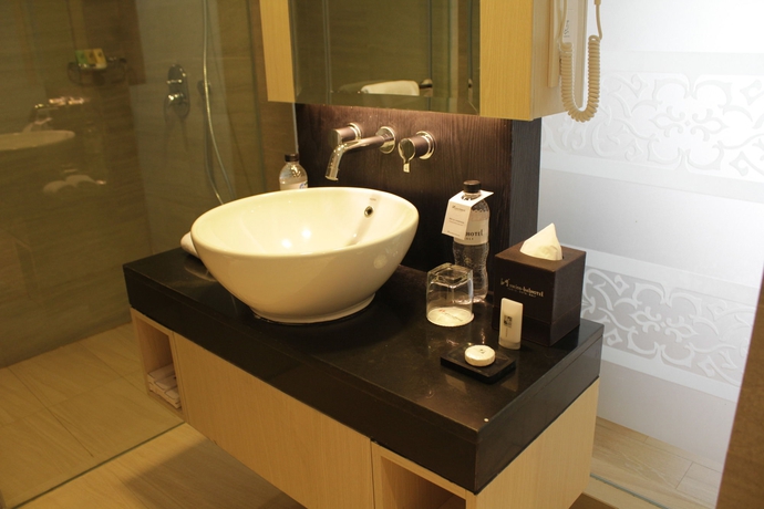 Imagen de la habitación del Hotel Swiss-belhotel Tuban. Foto 9