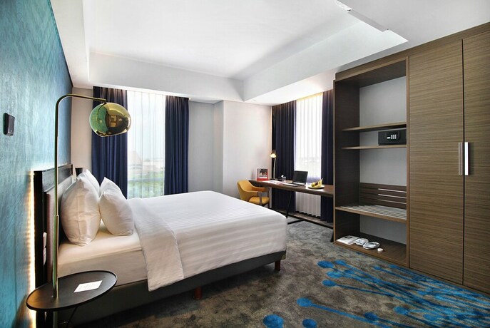 Imagen de la habitación del Hotel Swiss-belinn Airport Surabaya. Foto 14