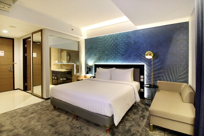 Imagen de la habitación del Hotel Swiss-belinn Airport Surabaya. Foto 17