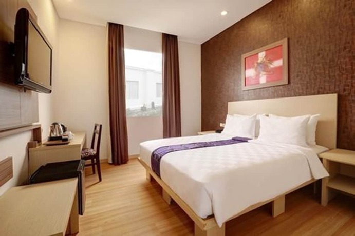 Imagen de la habitación del Hotel Swiss-belinn Panakkukang Makassar. Foto 4