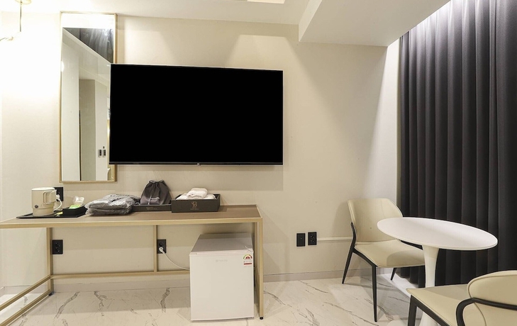 Imagen de la habitación del Hotel Swissbella. Foto 9