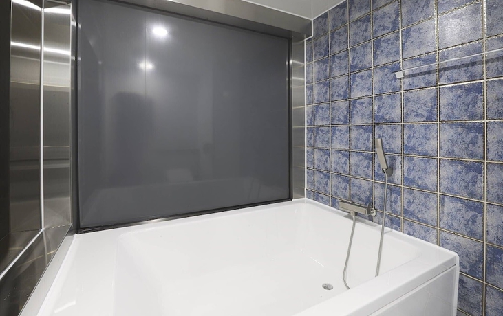 Imagen de la habitación del Hotel Swissbella. Foto 15