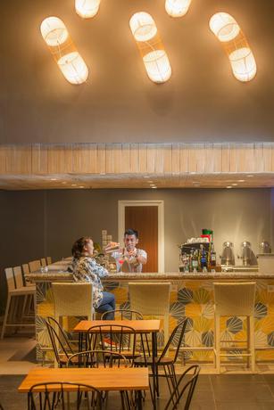 Imagen del bar/restaurante del Hotel Swiss-belresort Belitung - Chse Certified. Foto 5
