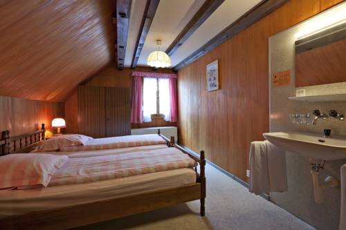 Imagen de la habitación del Hotel Swiss-chalet Merlischachen - Historik Chalet-hotel Lodge. Foto 8