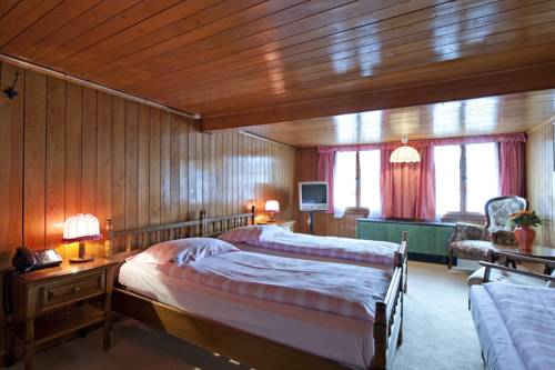 Imagen de la habitación del Hotel Swiss-chalet Merlischachen - Historik Chalet-hotel Lodge. Foto 9