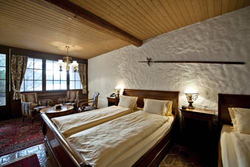 Imagen de la habitación del Hotel Swiss-chalet Merlischachen - Romantik Schloss-hotel Am See. Foto 13