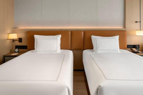 Imagen de la habitación del Hotel Swissôtel Beijing Hong Kong Macau Center. Foto 14