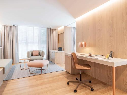 Imagen de la habitación del Hotel Swissôtel Kursaal Bern. Foto 12