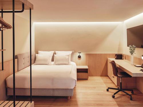 Imagen de la habitación del Hotel Swissôtel Kursaal Bern. Foto 14