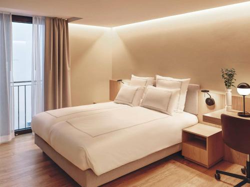 Imagen de la habitación del Hotel Swissôtel Kursaal Bern. Foto 15