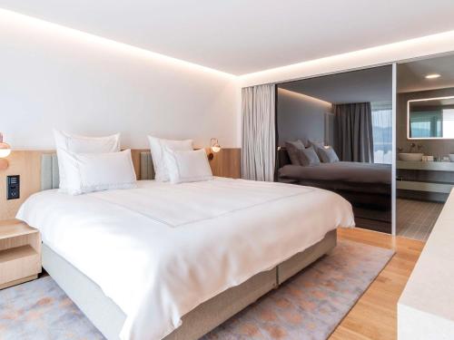 Imagen de la habitación del Hotel Swissôtel Kursaal Bern. Foto 20