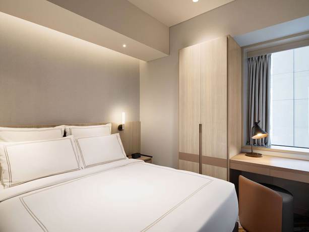 Imagen de la habitación del Hotel Swiss&ocirc;tel Living Jakarta Mega Kuningan. Foto 2