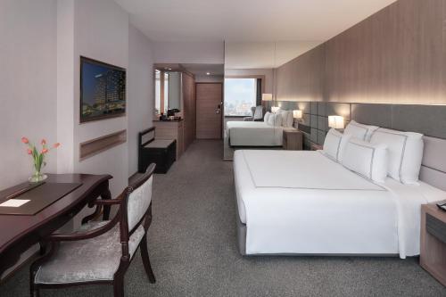 Imagen de la habitación del Hotel Swissotel Bangkok Ratchada. Foto 17