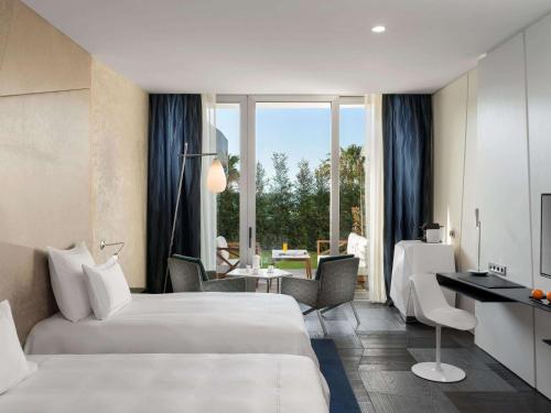 Imagen de la habitación del Hotel Swissotel Resort Bodrum Beach. Foto 19