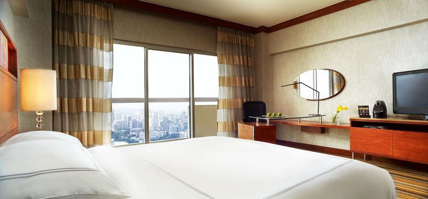 Imagen de la habitación del Hotel Swissotel The Stamford, Singapore. Foto 11
