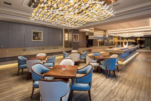 Imagen del bar/restaurante del Hotel Swisstouches Xian. Foto 2