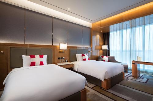 Imagen de la habitación del Hotel Swisstouches Xian. Foto 5