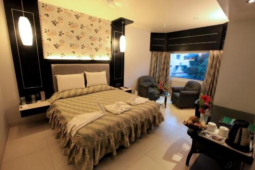 Imagen de la habitación del Hotel Swosti Grand. Foto 7