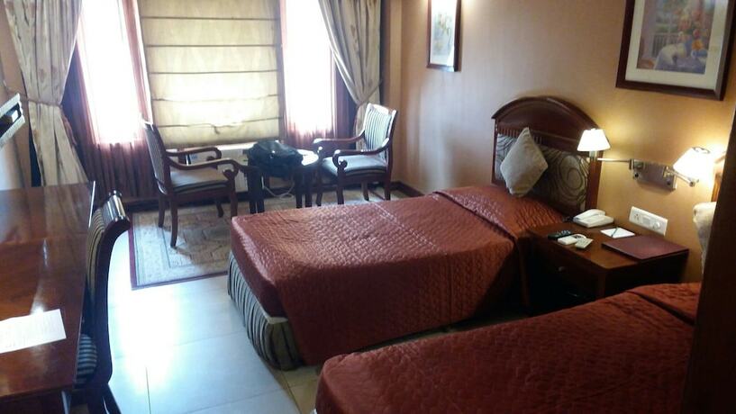 Imagen de la habitación del Hotel Swosti Premium Bhubaneswar. Foto 9