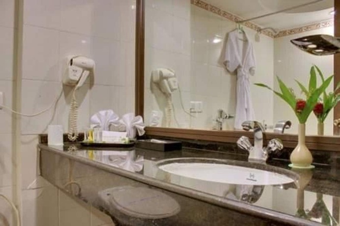 Imagen de la habitación del Hotel Swosti Premium Bhubaneswar. Foto 11