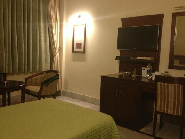 Imagen de la habitación del Hotel Swosti Premium Bhubaneswar. Foto 15